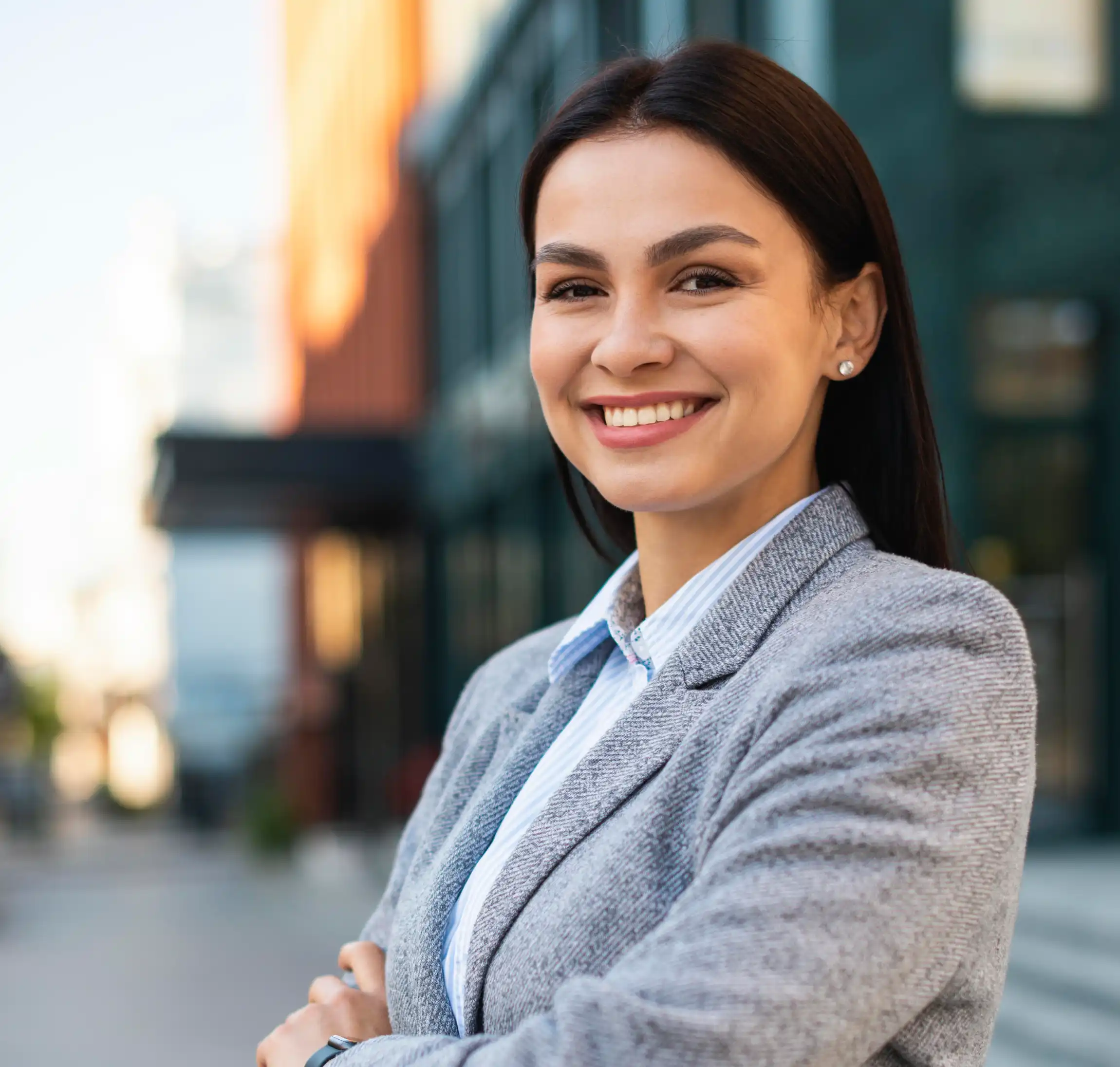 smiling-young-male-professional-standing-with-arms-crossed-while-making-eye-contact-against-isolated-background (3)